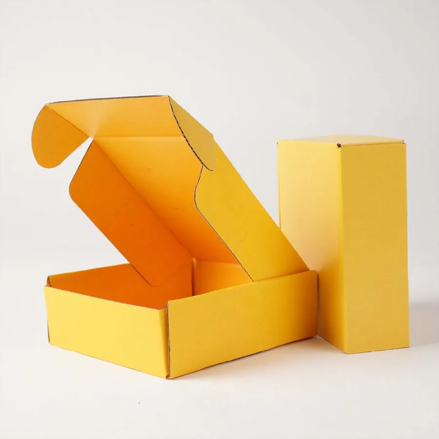 Yellow Mailer Boxes printed with a custom design